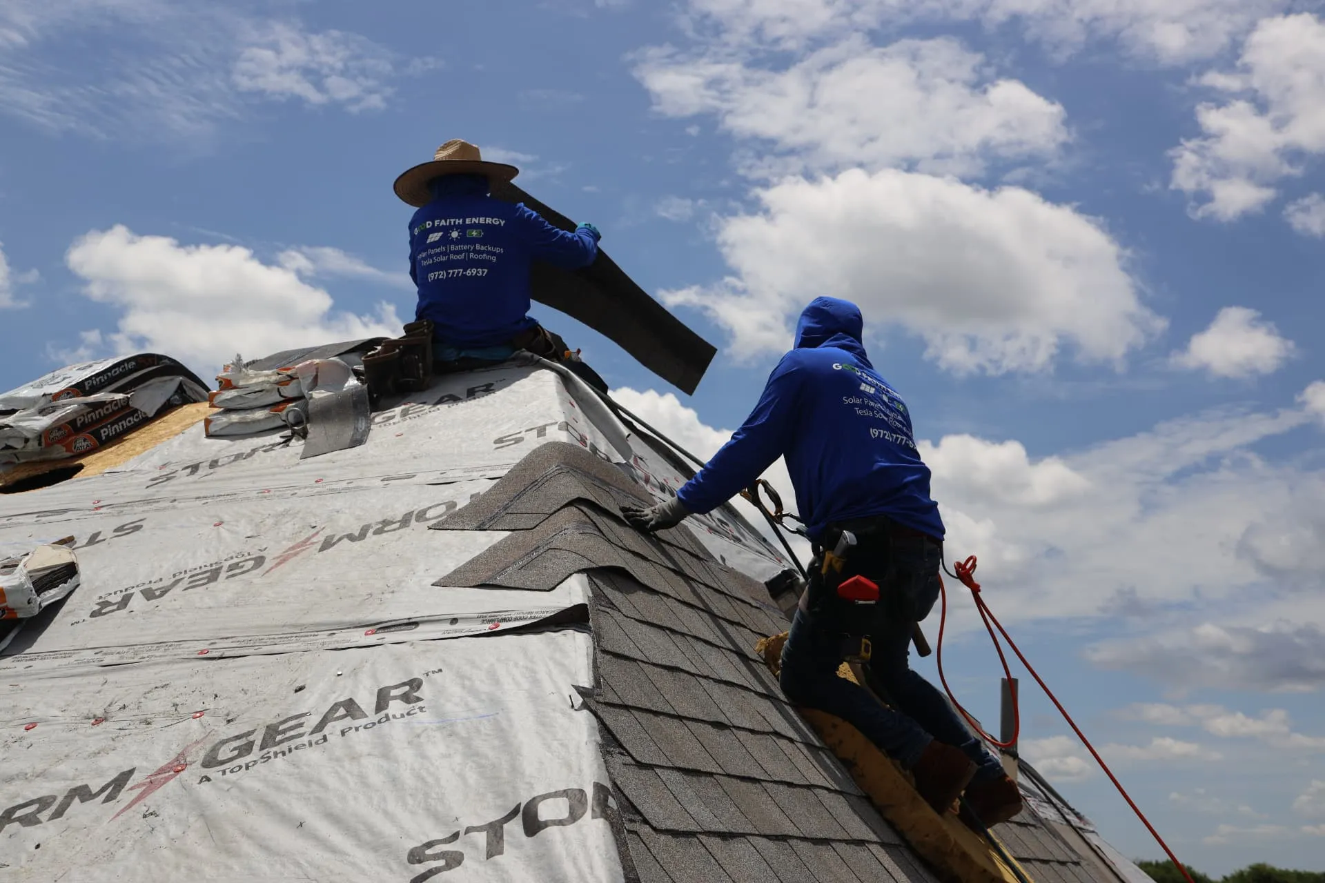 Good Faith Roofing crew working on a North Texas roof over new synthetic underlayment