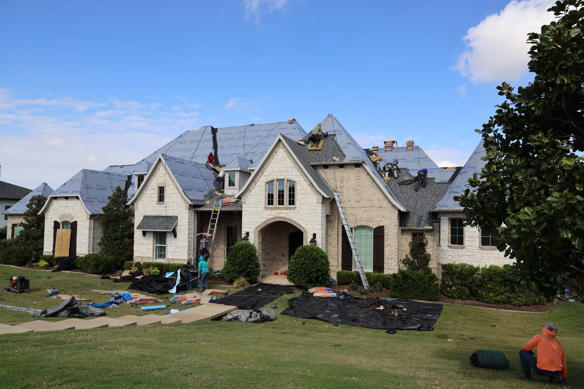 Front roof slopes of the Prosper home covered with synthetic underlayment