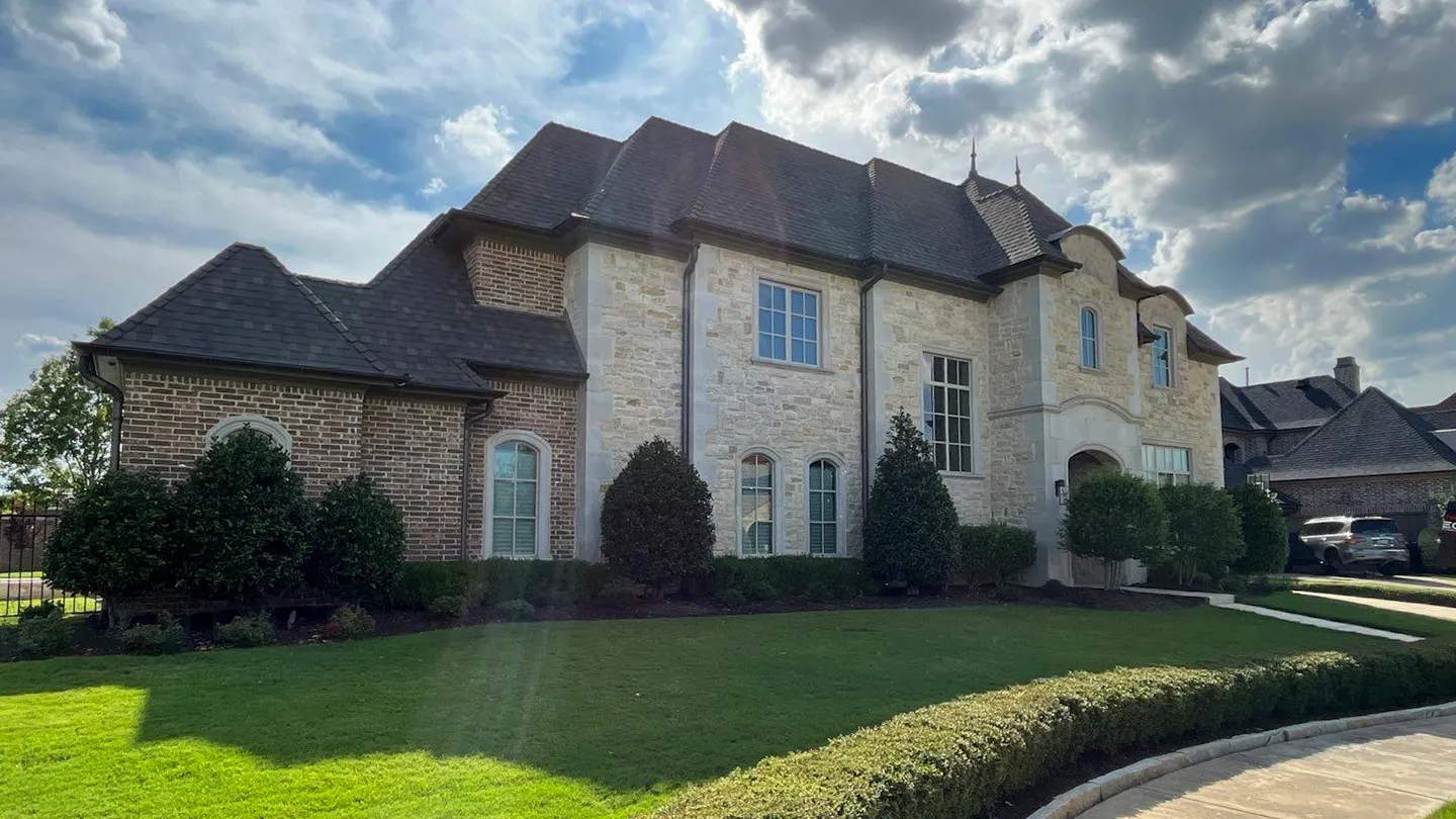 Denton Texas older craftsman home with steep gables and a gray shingle roof