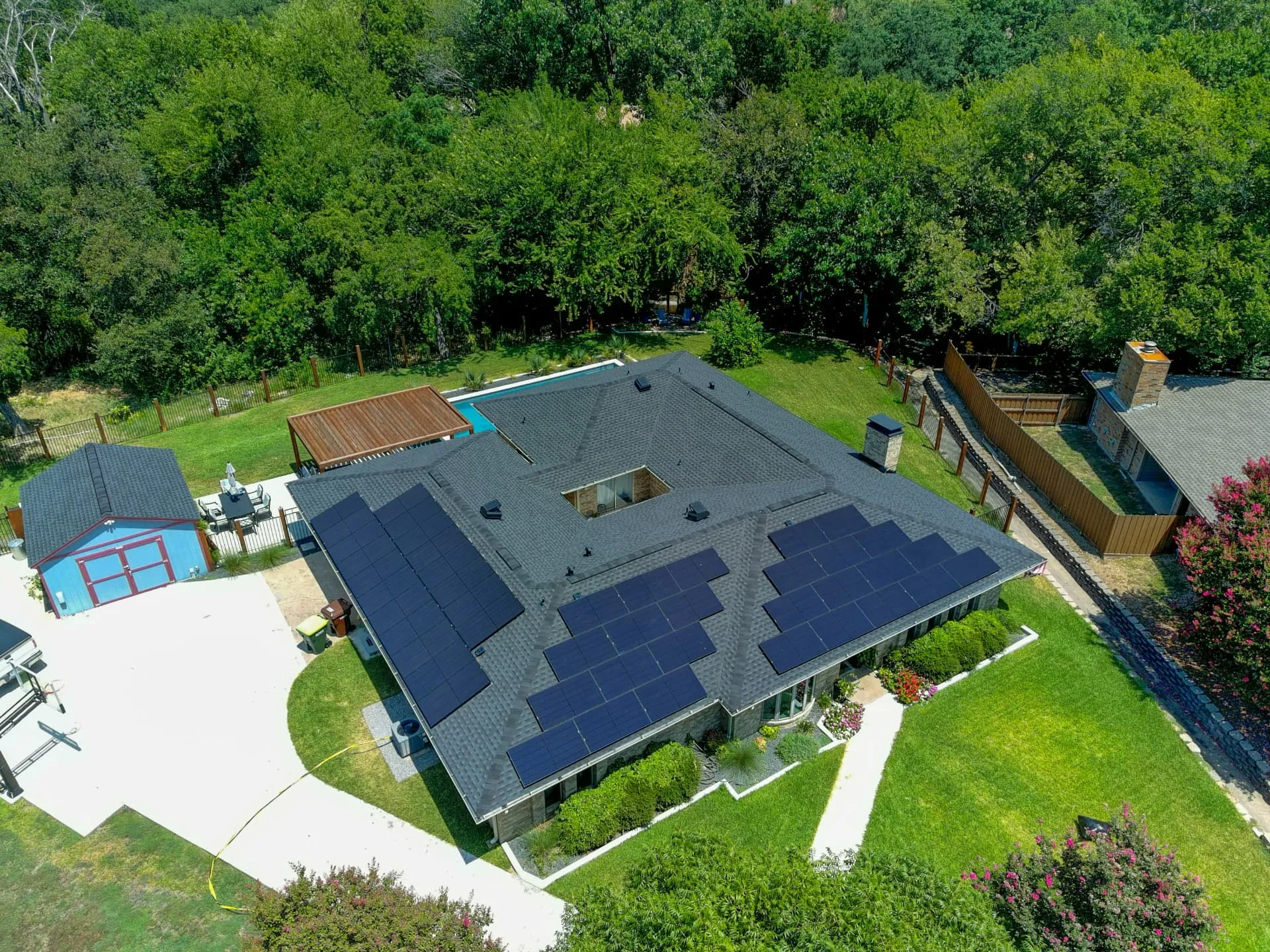 Allen, Texas home with a brick exterior and dimensional shingle roof