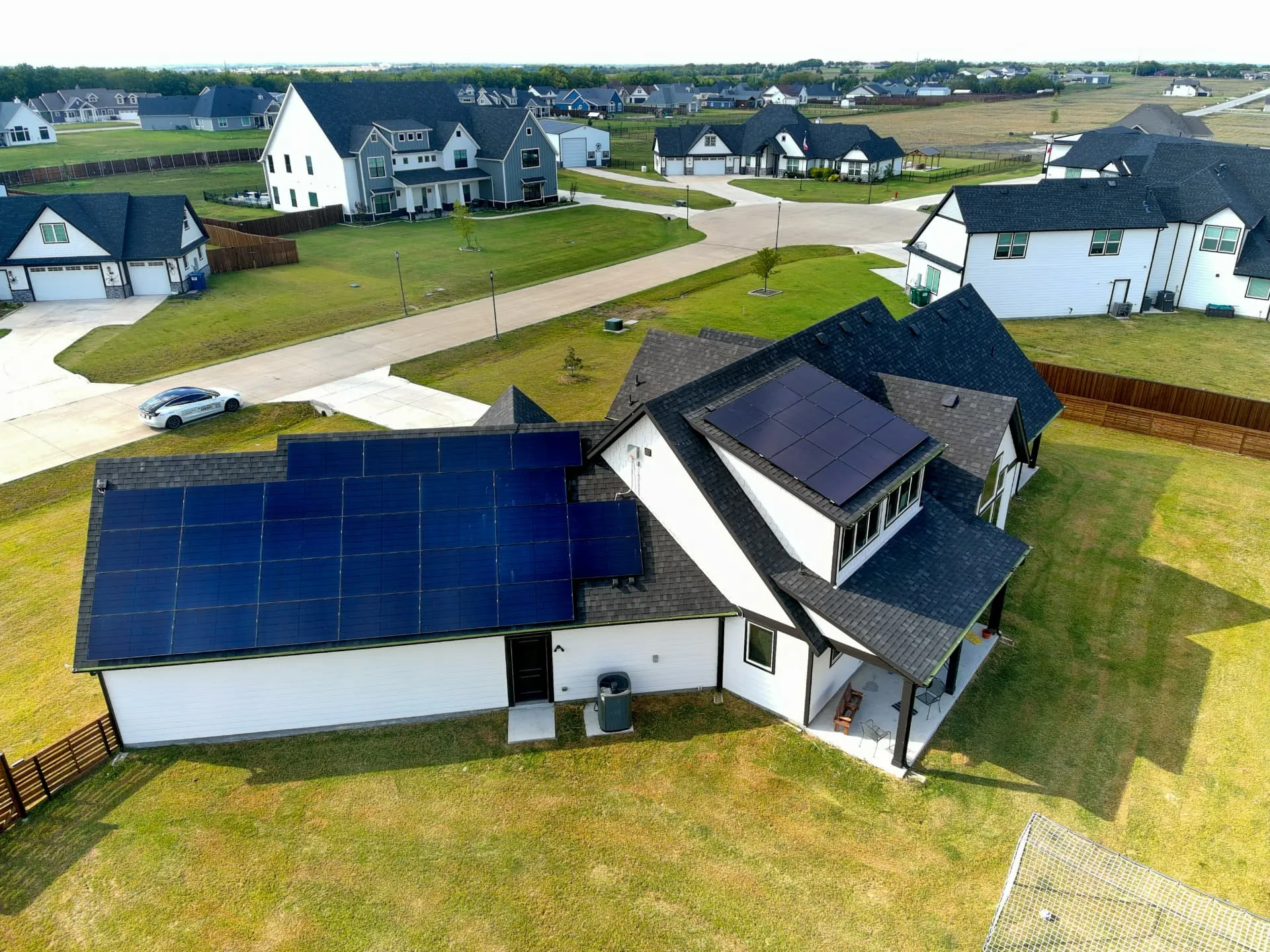 Roof inspection underway on an established Garland home