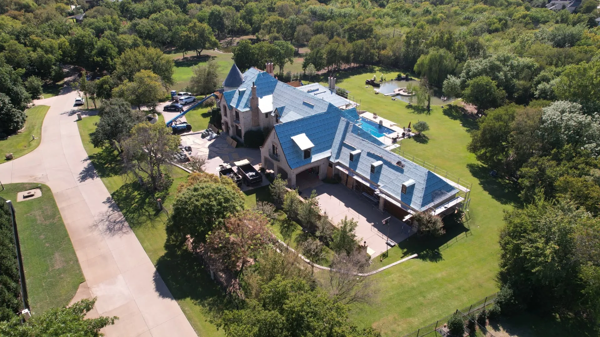 Aerial view of a DFW roof replacement project by Good Faith Roofing